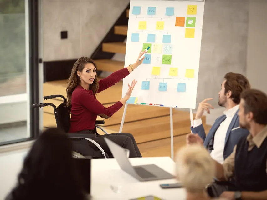 A strategist presenting a positioning plan to a small team